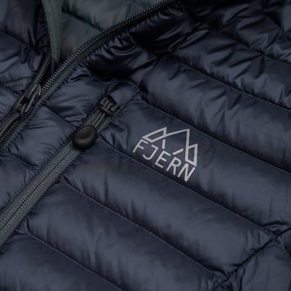 Fjern - Womens Aktiv Down Hoodless Jacket (Storm Grey/Charcoal) | Venture further with the Aktiv, a versatile and lightweight insulated layer that offers exceptional warmth in a compact package