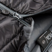 Fjern - Womens Arktis Down Gilet (Black/Charcoal) | Designed to provide core warmth without the weight, this gilet features a clean, sleeveless design for unrestrictive movement during active pursuits