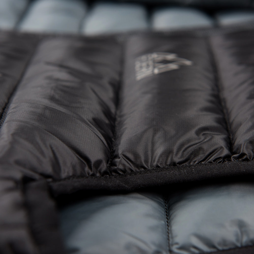 Fjern - Womens Arktis Down Gilet (Black/Charcoal) | Designed to provide core warmth without the weight, this gilet features a clean, sleeveless design for unrestrictive movement during active pursuits