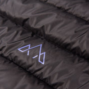 Fjern - Womens Arktis Down Gilet (Black/Purple) | Designed to provide core warmth without the weight, this gilet features a clean, sleeveless design for unrestrictive movement during active pursuits