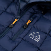 Fjern - Womens Eldur Eco Insulated Jacket (Navy) | The Eldur Jacket is your essential lightweight, warm, and sustainable choice for outdoor adventures