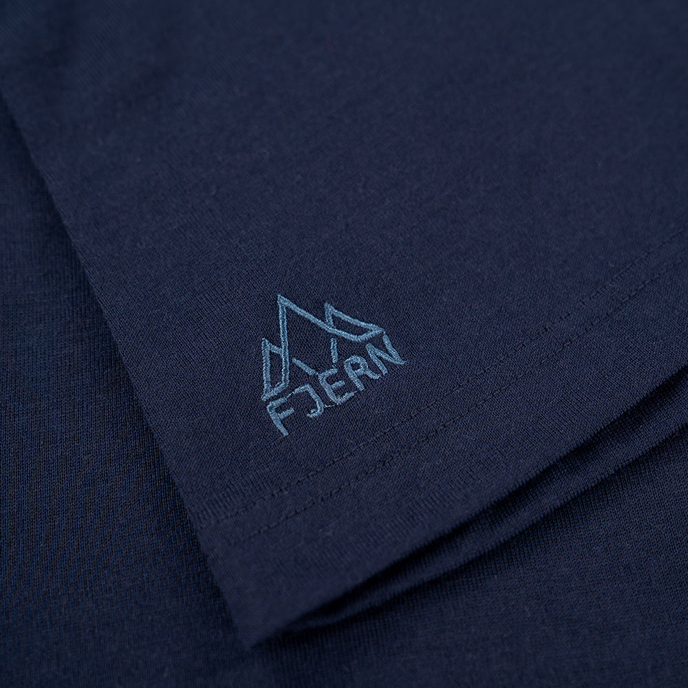 Fjern - Womens Första Merino Blend Long Sleeve Hoodie Baselayer (Navy) | Embark on your next adventure with the Första Hoodie, a lightweight and high-performance technical hoodie