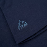 Fjern - Womens Första Merino Blend Long Sleeve Hoodie Baselayer (Navy) | Embark on your next adventure with the Första Hoodie, a lightweight and high-performance technical hoodie