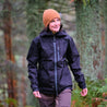 Fjern - Womens Forsvar Eco Waterproof Jacket (Black) | A testament to sustainable exploration, the Forsvar integrates planet-conscious waterproofing with a 15k/15k ecoSHIELD® fabric, crafted entirely from recycled polyester