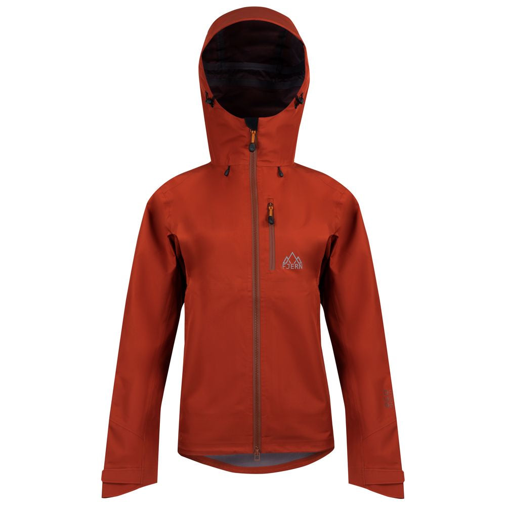 Fjern - Womens Forsvar Eco Waterproof Jacket (Spice) | A testament to sustainable exploration, the Forsvar integrates planet-conscious waterproofing with a 15k/15k ecoSHIELD® fabric, crafted entirely from recycled polyester
