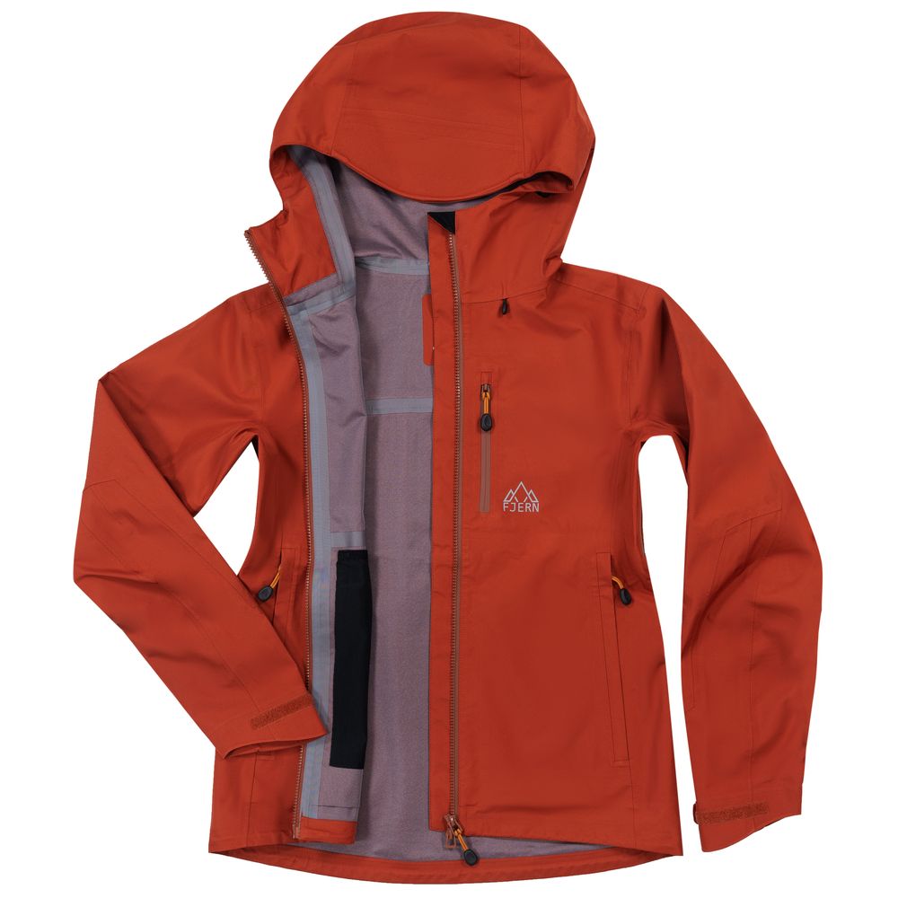 Fjern - Womens Forsvar Eco Waterproof Jacket (Spice) | A testament to sustainable exploration, the Forsvar integrates planet-conscious waterproofing with a 15k/15k ecoSHIELD® fabric, crafted entirely from recycled polyester