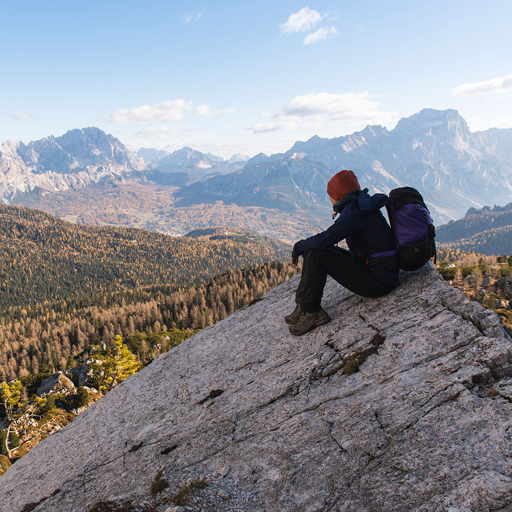 Rust) | Conquer the mountains with the Grenser softshell, the ultimate jacket for alpine adventures