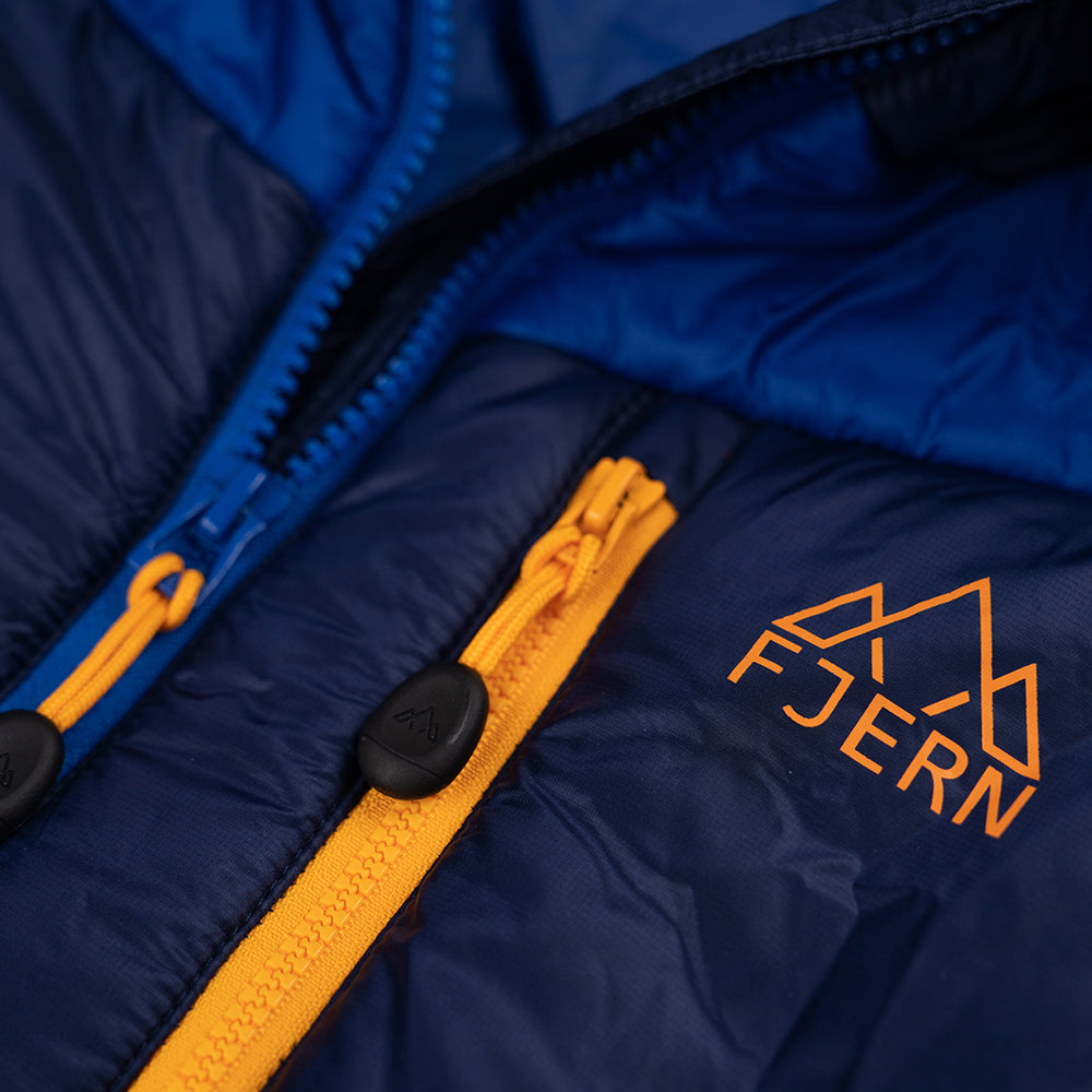 Fjern - Womens Husly Super Insulated Jacket (Navy/Electric) | Brave the extreme cold with our warmest insulated layer, perfect for climbing and outdoor adventures in frigid conditions