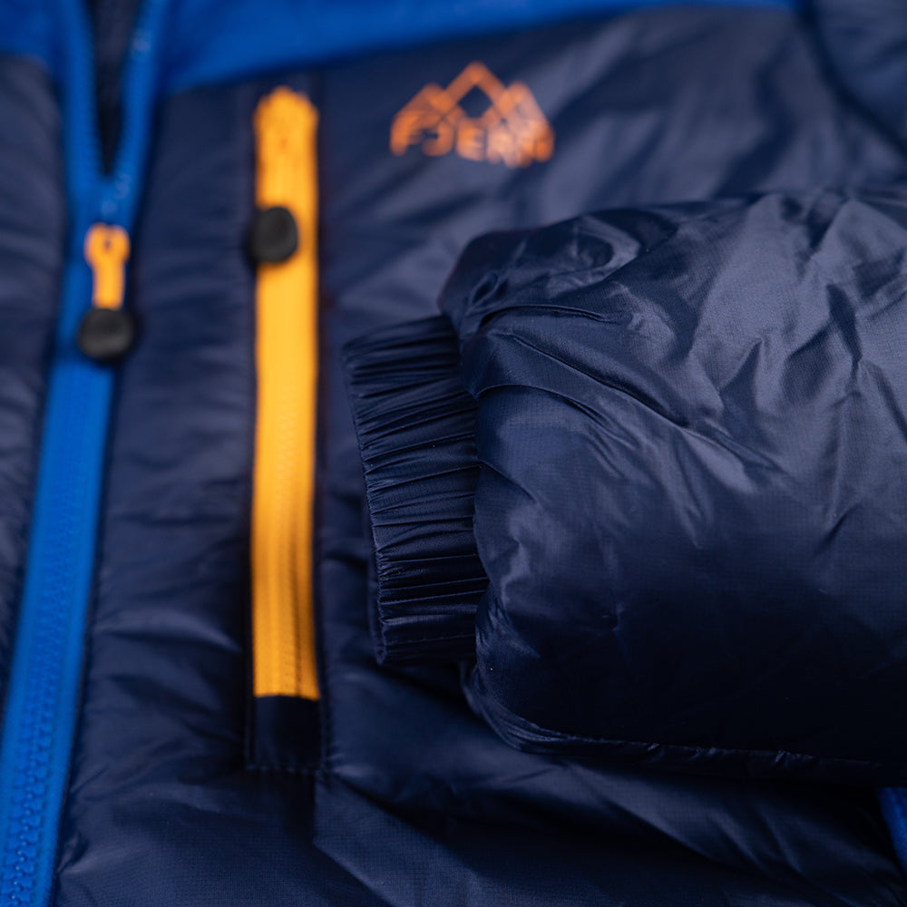 Fjern - Womens Husly Super Insulated Jacket (Navy/Electric) | Brave the extreme cold with our warmest insulated layer, perfect for climbing and outdoor adventures in frigid conditions