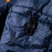 Fjern - Womens Husly Super Insulated Jacket (Navy/Electric) | Brave the extreme cold with our warmest insulated layer, perfect for climbing and outdoor adventures in frigid conditions