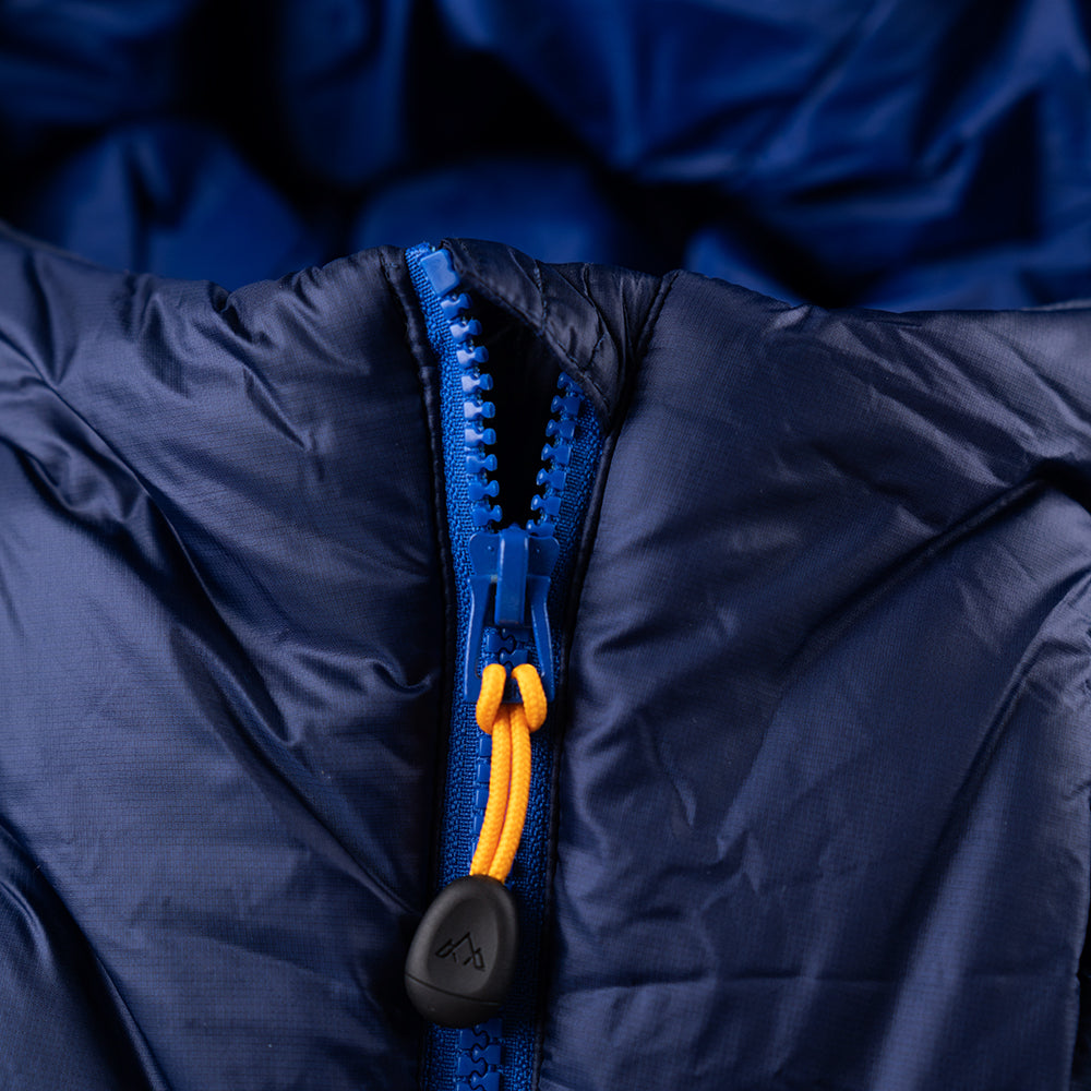Fjern - Womens Husly Super Insulated Jacket (Navy/Electric) | Brave the extreme cold with our warmest insulated layer, perfect for climbing and outdoor adventures in frigid conditions