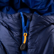 Fjern - Womens Husly Super Insulated Jacket (Navy/Electric) | Brave the extreme cold with our warmest insulated layer, perfect for climbing and outdoor adventures in frigid conditions