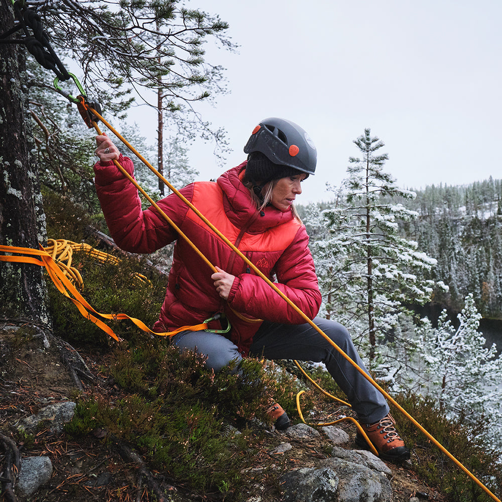 Orange) | Brave the extreme cold with our warmest insulated layer, perfect for climbing and outdoor adventures in frigid conditions