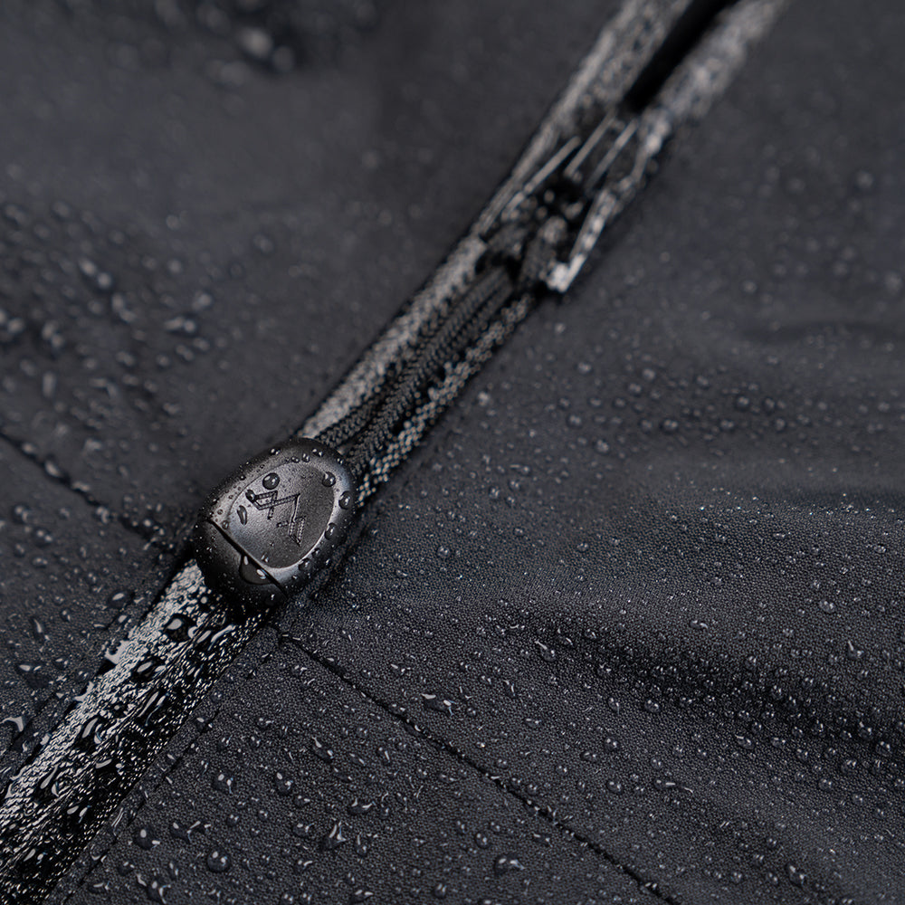 Fjern - Womens Orkan Waterproof Shell Jacket (Stealth) | Face the harshest alpine challenges with confidence in the Orkan jacket, engineered to excel in extreme conditions