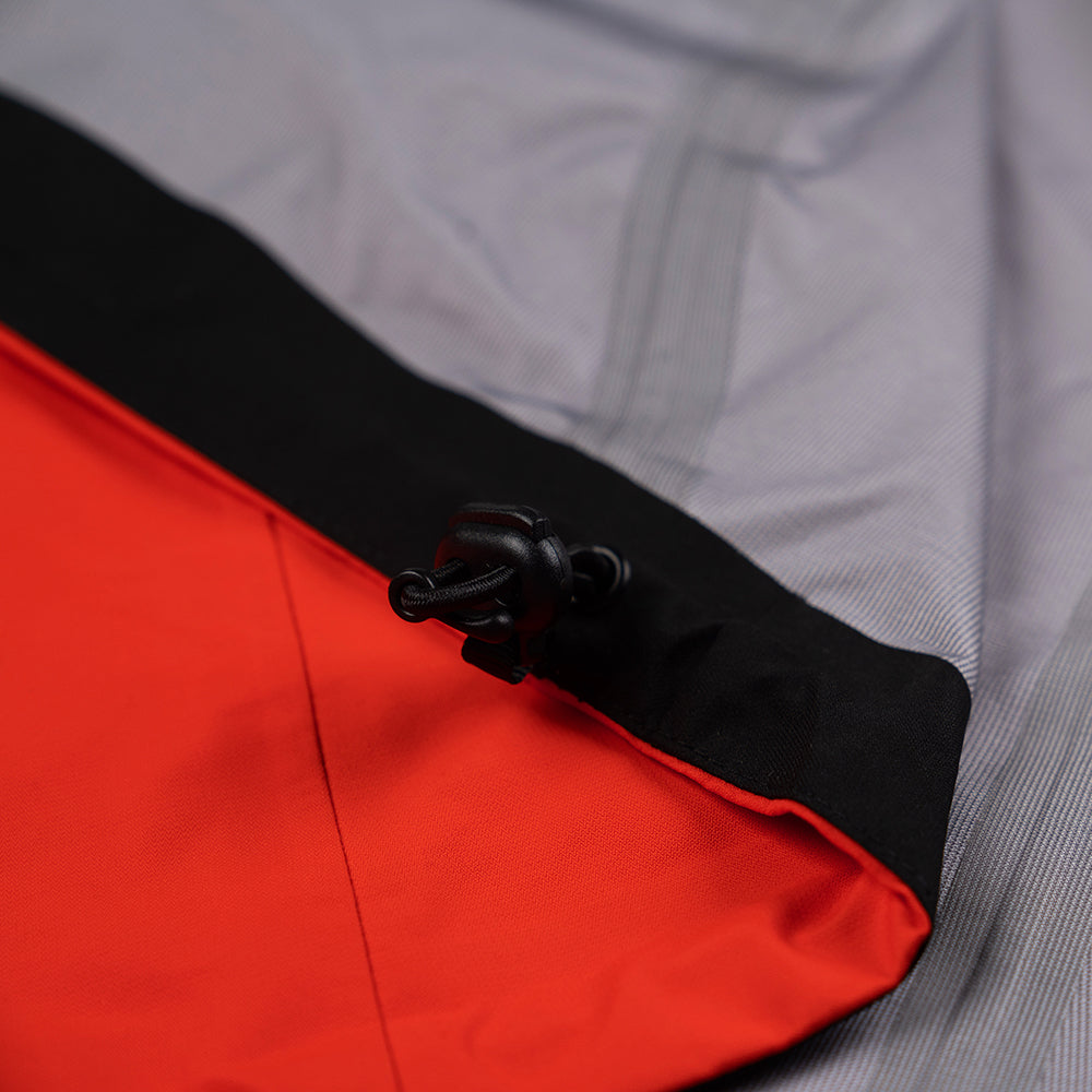 Fjern - Womens Orkan Waterproof Shell Jacket (Orange/Navy) | Face the harshest alpine challenges with confidence in the Orkan jacket, engineered to excel in extreme conditions