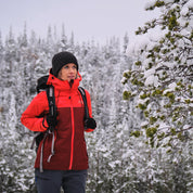 Fjern - Womens Orkan Waterproof Shell Jacket (Orange/Rust) | Face the harshest alpine challenges with confidence in the Orkan jacket, engineered to excel in extreme conditions