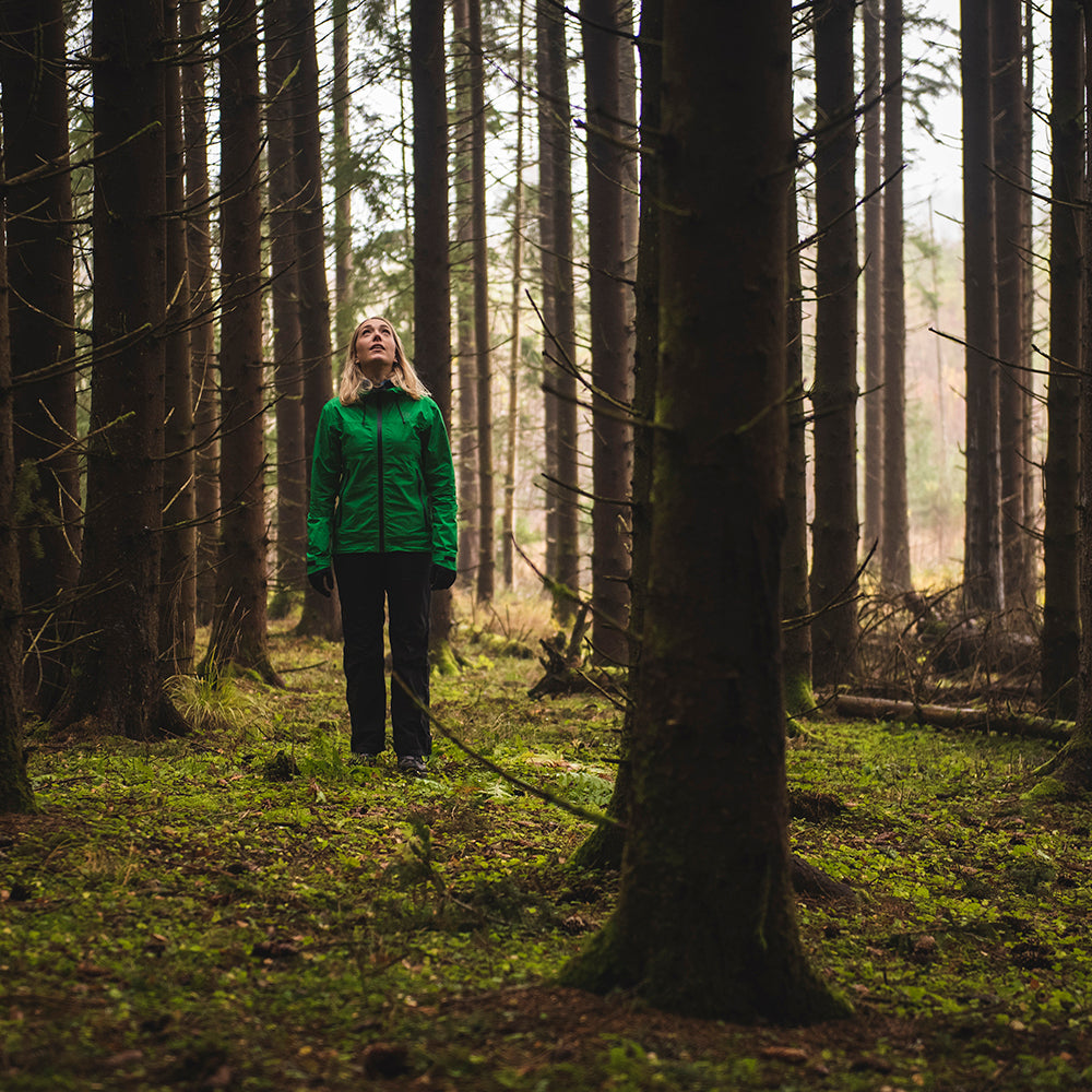 Fjern - Womens Skjold Packable Waterproof Jacket (Green/Pine) | The Skjold is your ultimate shield for fast and light activities, designed to keep you active in any weather