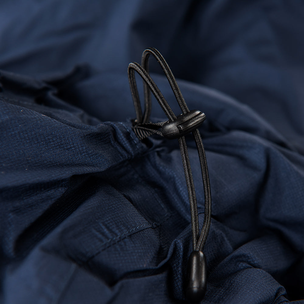 Fjern - Womens Skjold Packable Waterproof Jacket (Navy/Cobalt) | The Skjold is your ultimate shield for fast and light activities, designed to keep you active in any weather