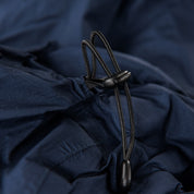Fjern - Womens Skjold Packable Waterproof Jacket (Navy/Cobalt) | The Skjold is your ultimate shield for fast and light activities, designed to keep you active in any weather
