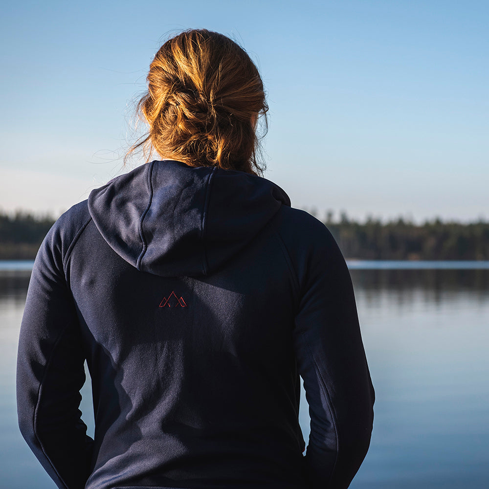 Fjern - Womens Vandring Stretch Fleece Jacket (Navy/Rust) | The Vandring is a mid-weight technical fleece hoodie designed for warmth, flexibility, and performance