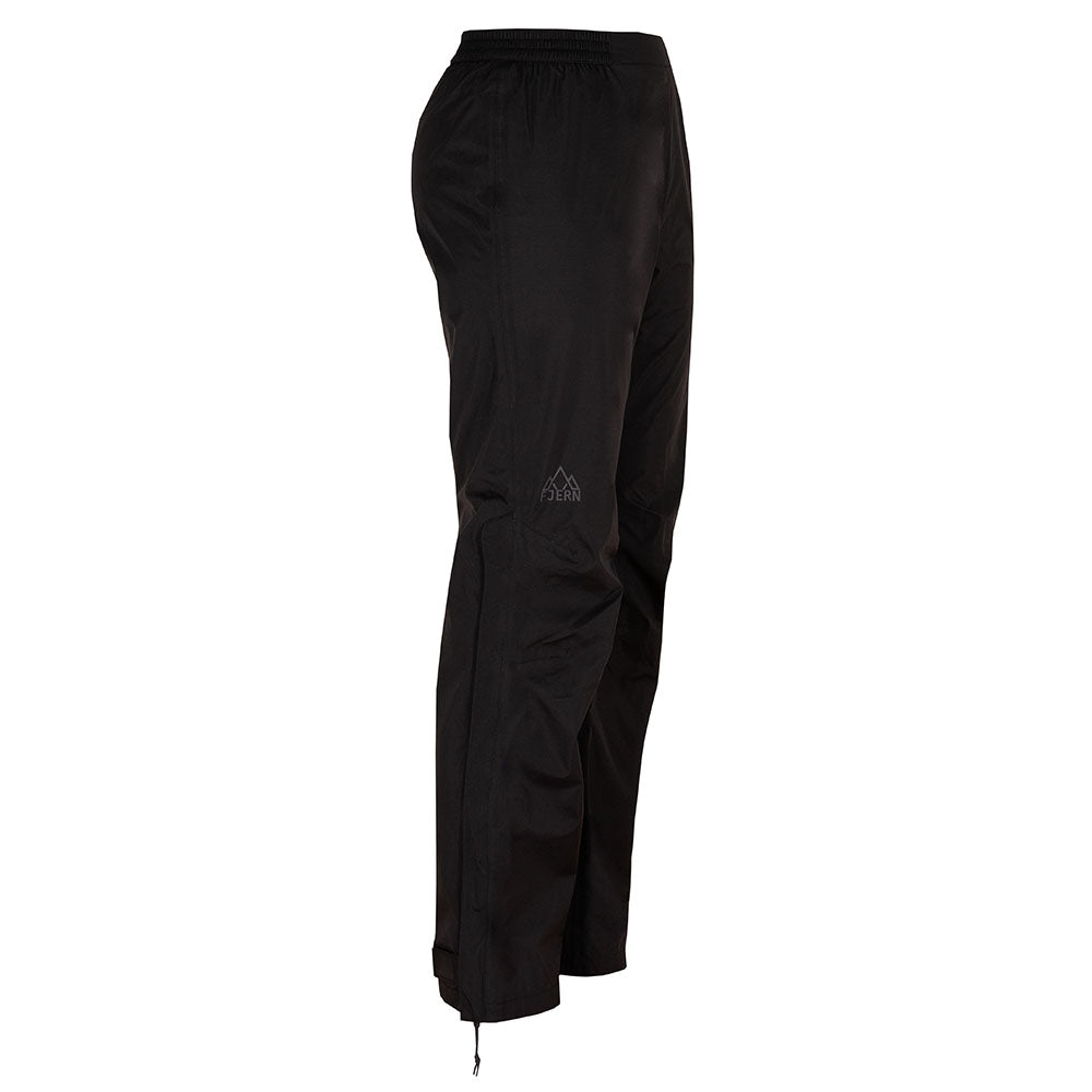 Fjern - Womens Vanntett Waterproof Trousers (Black) | Brave the elements with our mountaineering over-trousers, crafted from lightweight, waterproof Nylon ripstop with a DWR finish